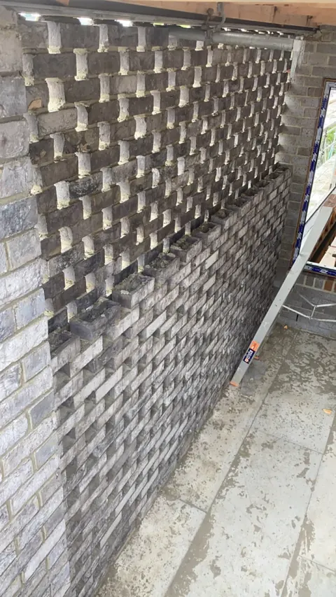 Cream brick with a light haze before cleaning