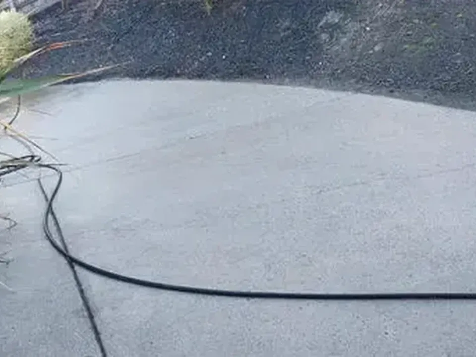 After: the same driveway fully cleaned