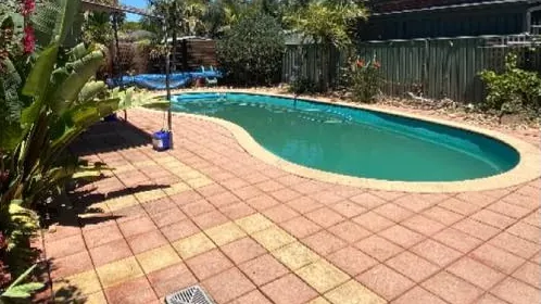 Pool surround pavers cleaned by Spotless